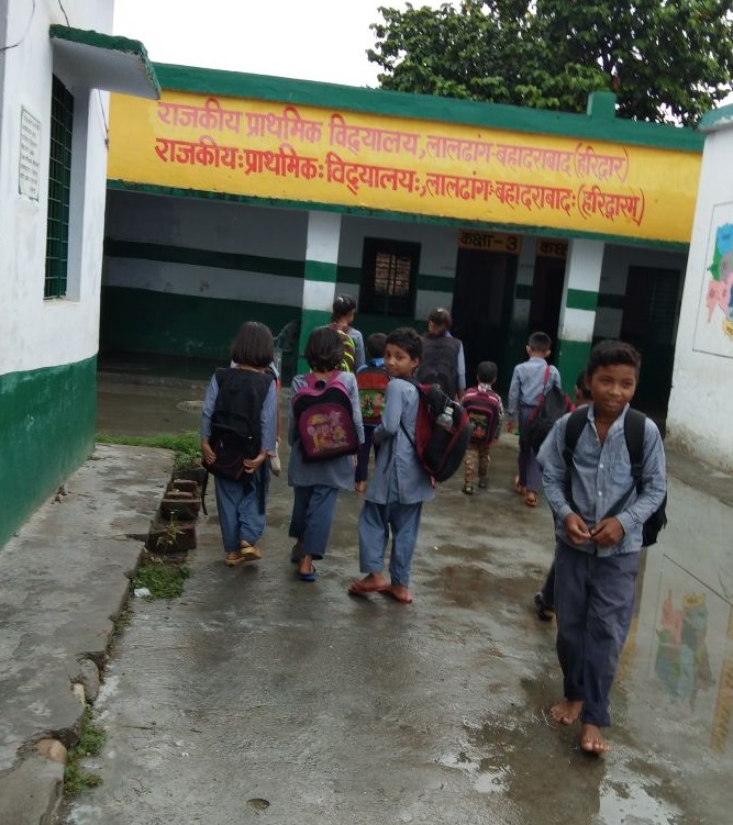 SHOES DISTRIBUTED TO THE STUDENTS OF PRIMARY SCHOOL OF LALDHANG